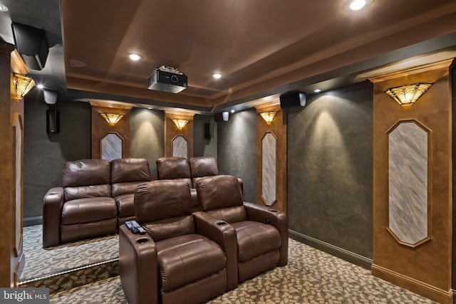 carpeted cinema with baseboards, recessed lighting, and a raised ceiling