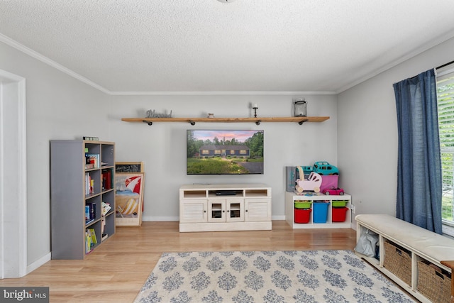 312 Richards Ferry Rd, Fredericksburg, VA 22406 - living area with wood finished floors, a textured ceiling, healthy amount of natural light, crown molding, and baseboards