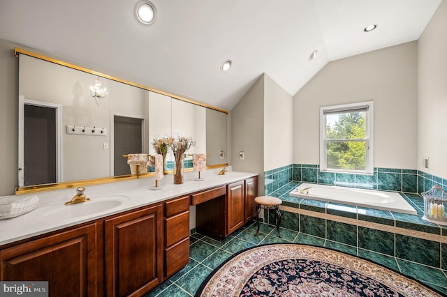 full bathroom featuring tile patterned floors, double vanity, a sink, a garden tub, and lofted ceiling