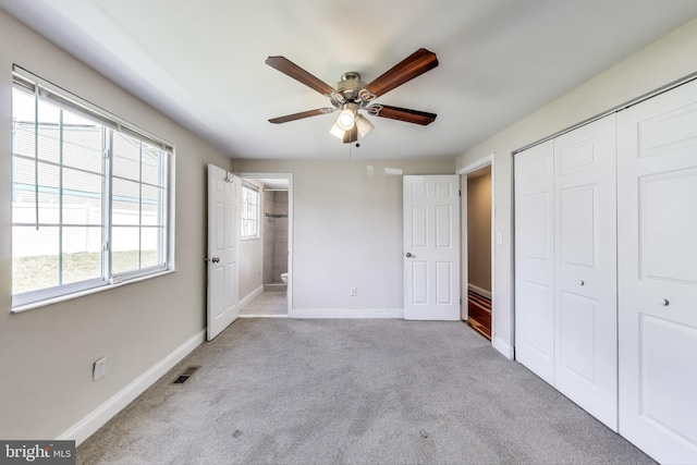 7910 E Nalley Rd, Hyattsville, MD 20785 - unfurnished bedroom featuring carpet, a closet, baseboards, ensuite bath, and ceiling fan