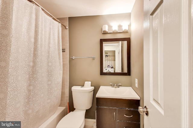 7910 E Nalley Rd, Hyattsville, MD 20785 - bathroom featuring vanity, toilet, and shower / bath combo with shower curtain