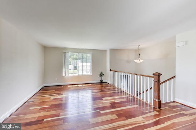 7910 E Nalley Rd, Hyattsville, MD 20785 - unfurnished room with wood finished floors and baseboards