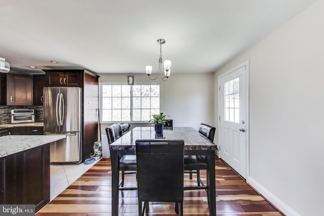 7910 E Nalley Rd, Hyattsville, MD 20785 - dining room with a chandelier, light wood-style flooring, recessed lighting, and baseboards