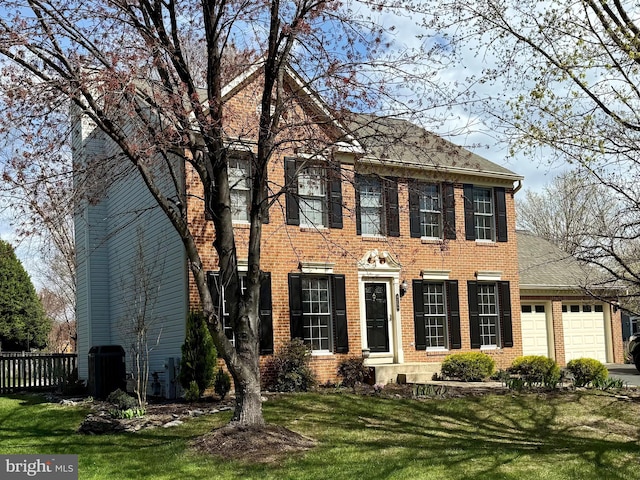 view of front of property featuring an attached garage, brick siding, roof with shingles, and driveway