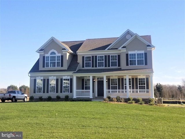 60 Persimmon Hills Ct, Sunderland, MD 20689 - view of front of property featuring covered porch, a front lawn, and roof with shingles