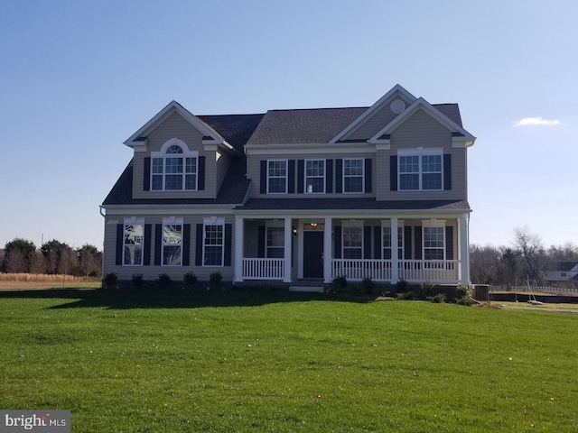 60 Persimmon Hills Ct, Sunderland, MD 20689 - view of front facade featuring a porch, a front yard, central AC unit, and a shingled roof