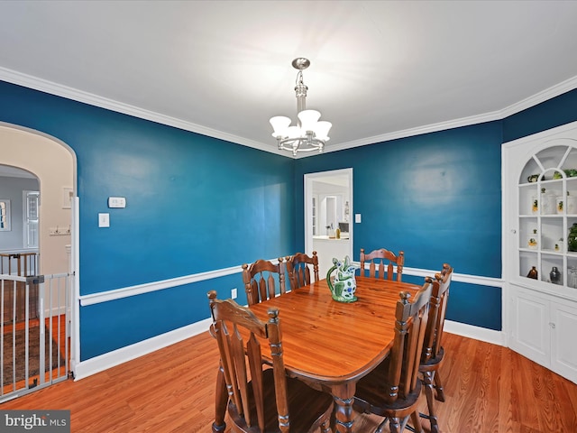 341 Creston Rd, York, PA 17403 - dining space with crown molding, an inviting chandelier, and wood finished floors
