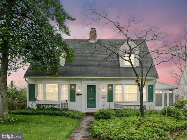 341 Creston Rd, York, PA 17403 - new england style home featuring a chimney and a front lawn