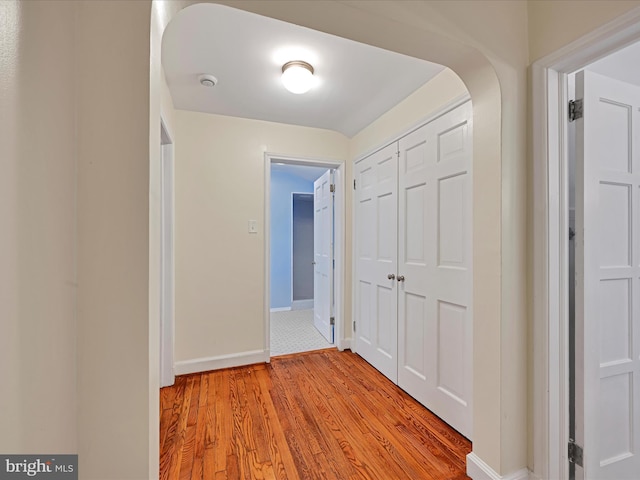 341 Creston Rd, York, PA 17403 - corridor with arched walkways, light wood-style flooring, and baseboards