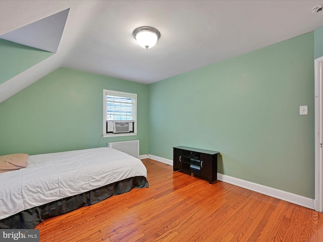 341 Creston Rd, York, PA 17403 - bedroom with radiator heating unit, cooling unit, baseboards, and wood finished floors