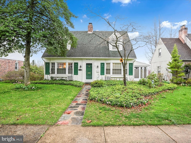 341 Creston Rd, York, PA 17403 - new england style home featuring roof with shingles, a chimney, and a front lawn