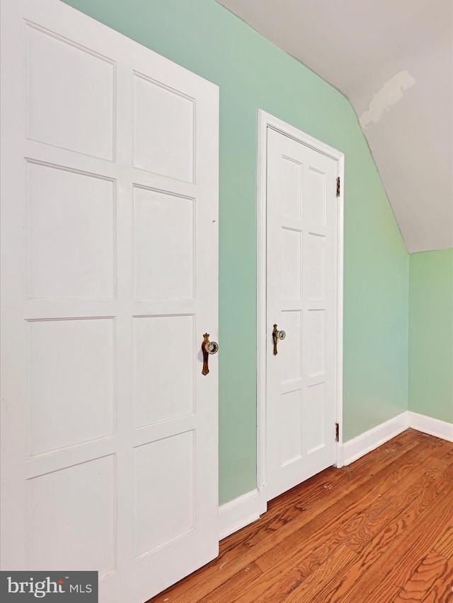 341 Creston Rd, York, PA 17403 - bonus room with baseboards, vaulted ceiling, and wood finished floors