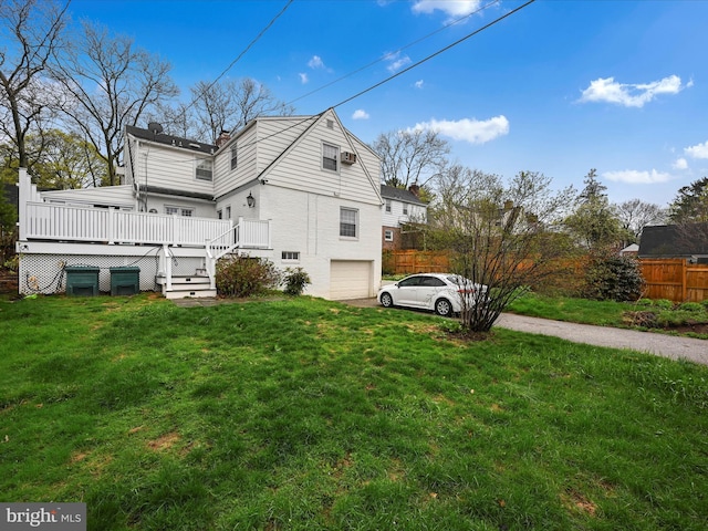341 Creston Rd, York, PA 17403 - view of property exterior with an attached garage, a lawn, a chimney, fence, and driveway