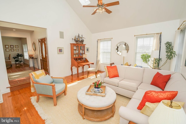 13470 Harrison Landing Rd, Princess Anne, MD 21853 - living room with a ceiling fan, high vaulted ceiling, and light wood-style floors