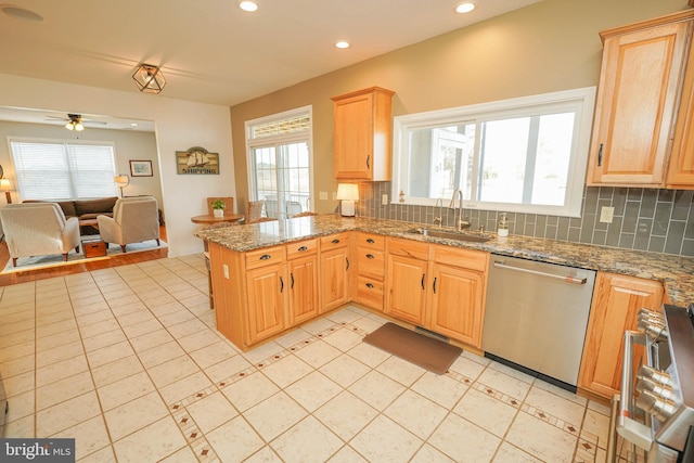 13470 Harrison Landing Rd, Princess Anne, MD 21853 - kitchen featuring dishwasher, a sink, light brown cabinetry, and a peninsula