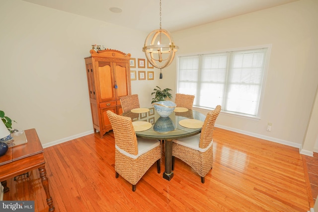 13470 Harrison Landing Rd, Princess Anne, MD 21853 - dining space featuring an inviting chandelier, baseboards, and light wood-type flooring