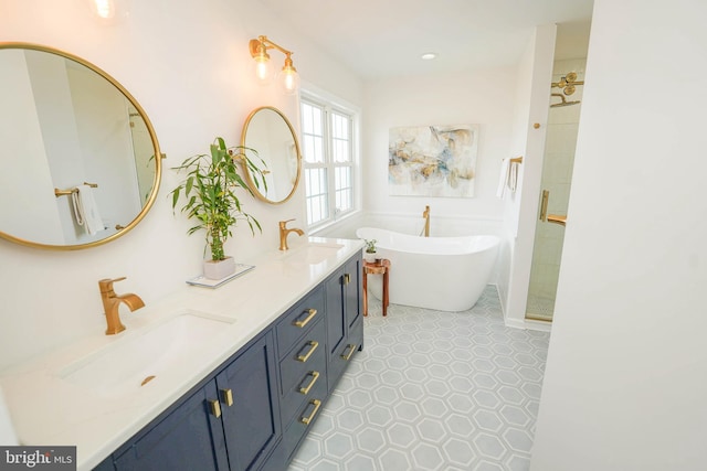 13470 Harrison Landing Rd, Princess Anne, MD 21853 - bathroom featuring double vanity, a sink, tile patterned floors, and a soaking tub