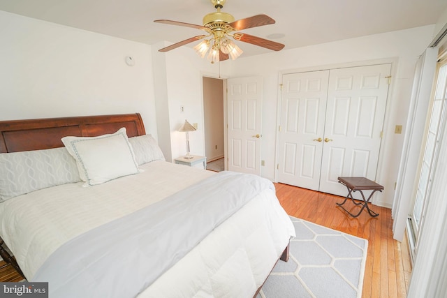 13470 Harrison Landing Rd, Princess Anne, MD 21853 - bedroom featuring a ceiling fan, a closet, and light wood-style floors