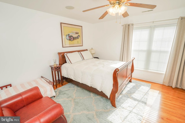 13470 Harrison Landing Rd, Princess Anne, MD 21853 - bedroom featuring visible vents, wood finished floors, and ceiling fan