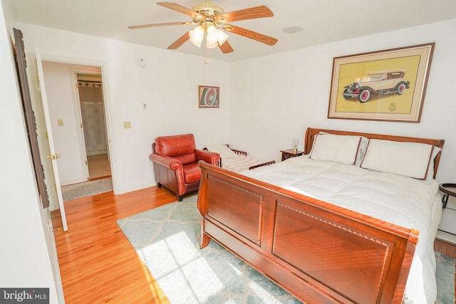 13470 Harrison Landing Rd, Princess Anne, MD 21853 - bedroom featuring baseboards, light wood-style flooring, and a ceiling fan
