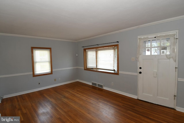 713 Cooper St, Florence, NJ 08518 - foyer entrance with crown molding, visible vents, hardwood / wood-style flooring, and baseboards