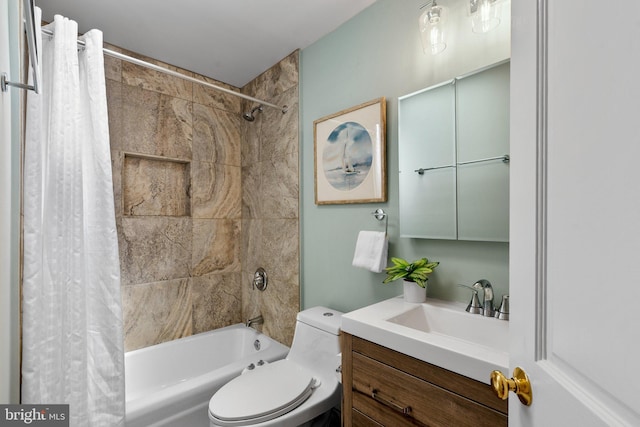 bathroom with toilet, shower / tub combo with curtain, and vanity