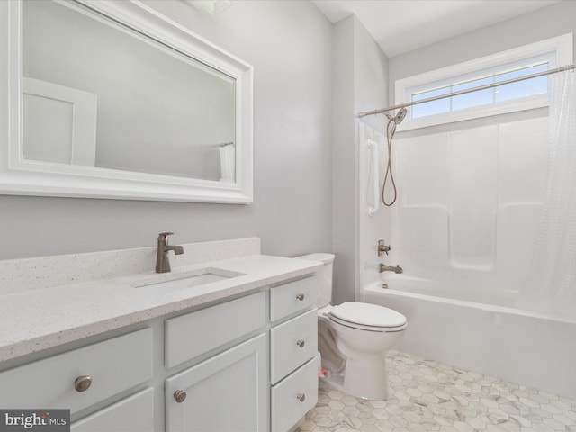 full bathroom featuring shower / bath combo, toilet, and vanity