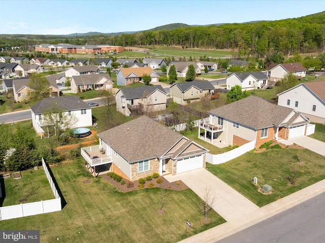 aerial view featuring a mountain view and a residential view