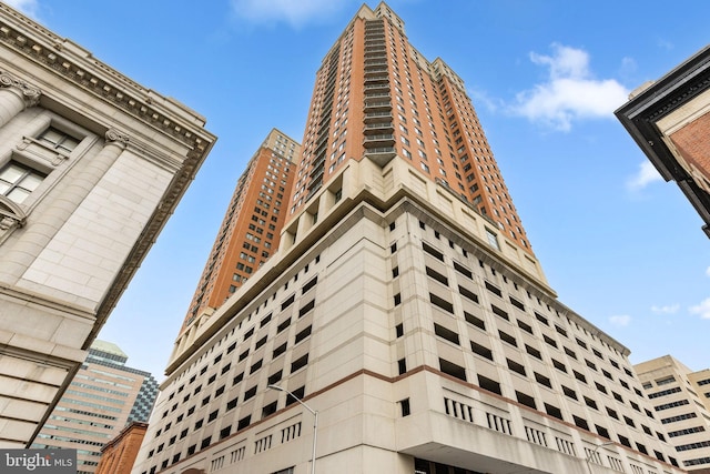 view of building exterior featuring a view of city