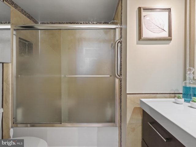 5505 Seminary Rd Unit 605N, Falls Church, VA 22041 - full bathroom featuring vanity, toilet, and shower / bath combination with glass door