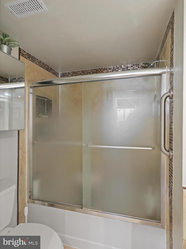 5505 Seminary Rd Unit 605N, Falls Church, VA 22041 - bathroom with enclosed tub / shower combo, toilet, and visible vents
