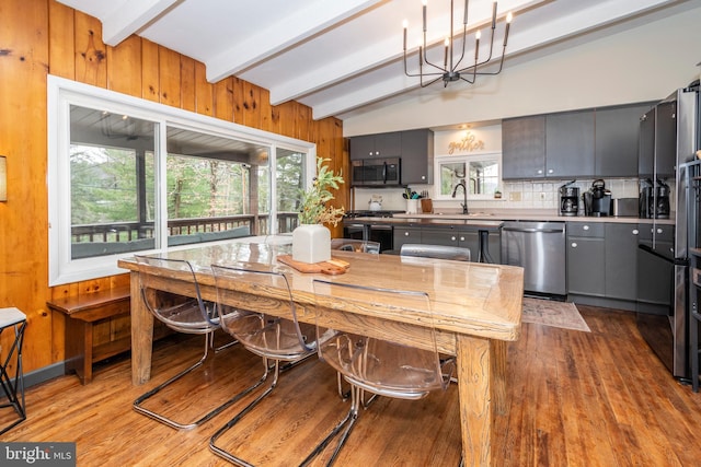 16 Jrs Dr, Mc Henry, MD 21541 - dining space featuring beamed ceiling, a wealth of natural light, and light wood-style flooring