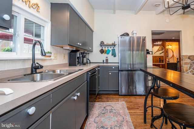16 Jrs Dr, Mc Henry, MD 21541 - kitchen with a sink, freestanding refrigerator, tasteful backsplash, gray cabinetry, and dark wood-style floors
