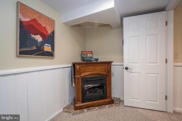 16 Jrs Dr, Mc Henry, MD 21541 - living room with a decorative wall, a glass covered fireplace, and a wainscoted wall