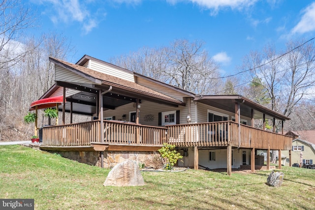 16 Jrs Dr, Mc Henry, MD 21541 - back of property featuring a lawn and a wooden deck