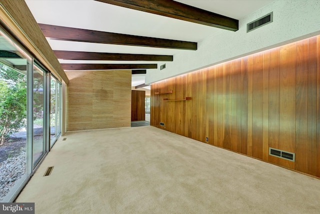 1408 Margarette Ave, Baltimore, MD 21286 - empty room with wooden walls, beamed ceiling, and carpet floors