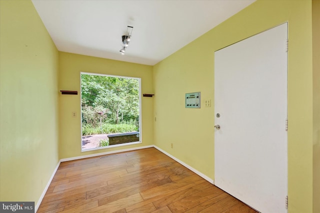 1408 Margarette Ave, Baltimore, MD 21286 - unfurnished room featuring hardwood / wood-style floors and track lighting