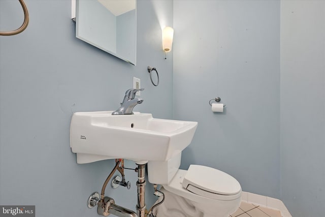 1408 Margarette Ave, Baltimore, MD 21286 - half bathroom featuring tile patterned flooring and toilet
