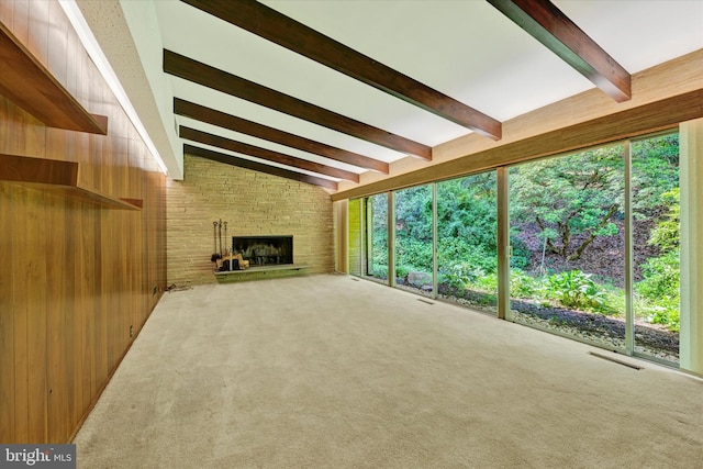1408 Margarette Ave, Baltimore, MD 21286 - unfurnished living room featuring beamed ceiling, carpet floors, a large fireplace, and wood walls
