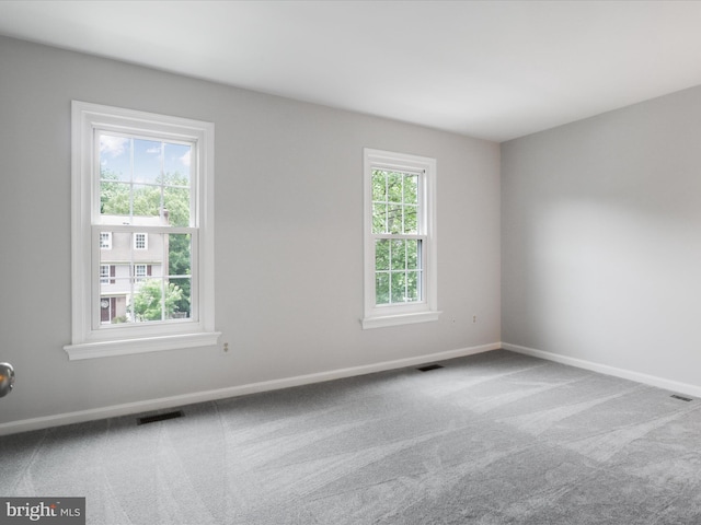 12617 Monarch Ct, Woodbridge, VA 22192 - carpeted empty room featuring baseboards