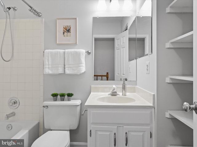 12617 Monarch Ct, Woodbridge, VA 22192 - bathroom featuring toilet, vanity, and washtub / shower combination