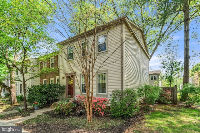 view of front of property with fence