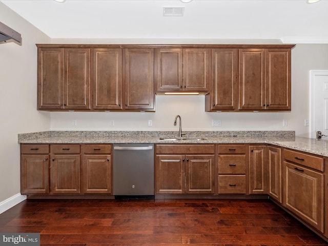 kitchen featuring stainless steel dishwasher, a sink, light stone countertops, dark wood-type flooring, and visible vents