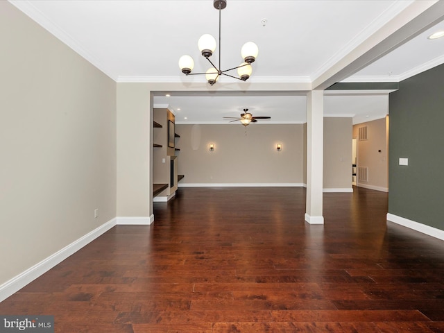 interior space featuring ceiling fan with notable chandelier, baseboards, wood finished floors, and crown molding