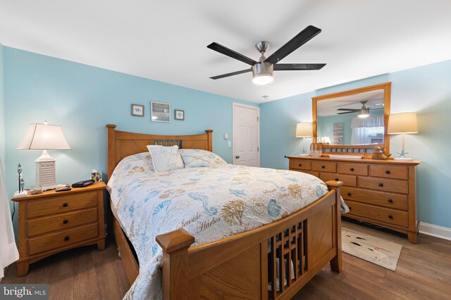 111 W 18th St Unit 2, Ship Bottom, NJ 08008 - bedroom with baseboards, wood finished floors, and ceiling fan