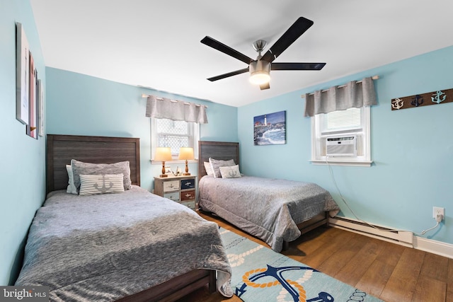 111 W 18th St Unit 2, Ship Bottom, NJ 08008 - bedroom with cooling unit, hardwood / wood-style flooring, a baseboard heating unit, and ceiling fan