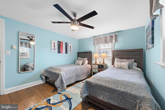 111 W 18th St Unit 2, Ship Bottom, NJ 08008 - bedroom featuring baseboards, a ceiling fan, and hardwood / wood-style flooring