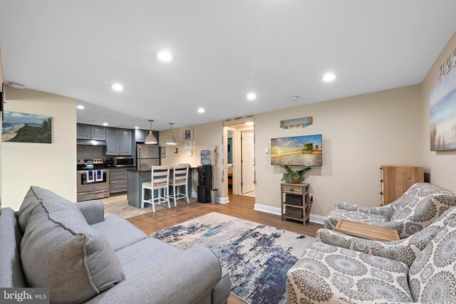 111 W 18th St Unit 2, Ship Bottom, NJ 08008 - living area featuring light wood-style flooring, baseboards, and recessed lighting