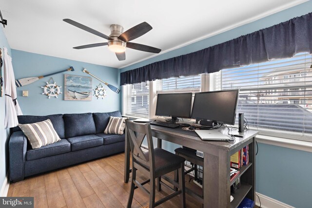 111 W 18th St Unit 2, Ship Bottom, NJ 08008 - office area with hardwood / wood-style floors, a ceiling fan, and baseboards
