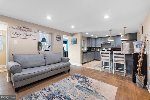 111 W 18th St Unit 2, Ship Bottom, NJ 08008 - living room with baseboards, light wood-style flooring, and recessed lighting